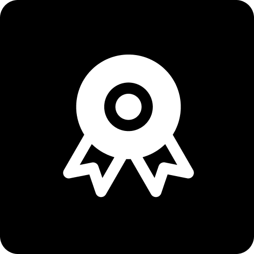 Black and white icon of a circular ribbon badge with two tails at the bottom.